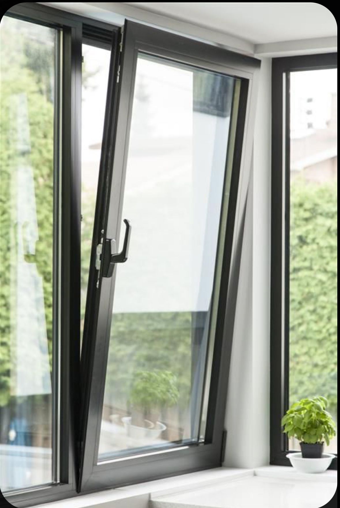 Aluminium tilt-and-turn hinged window